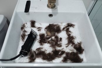 sink full of hair trimmings